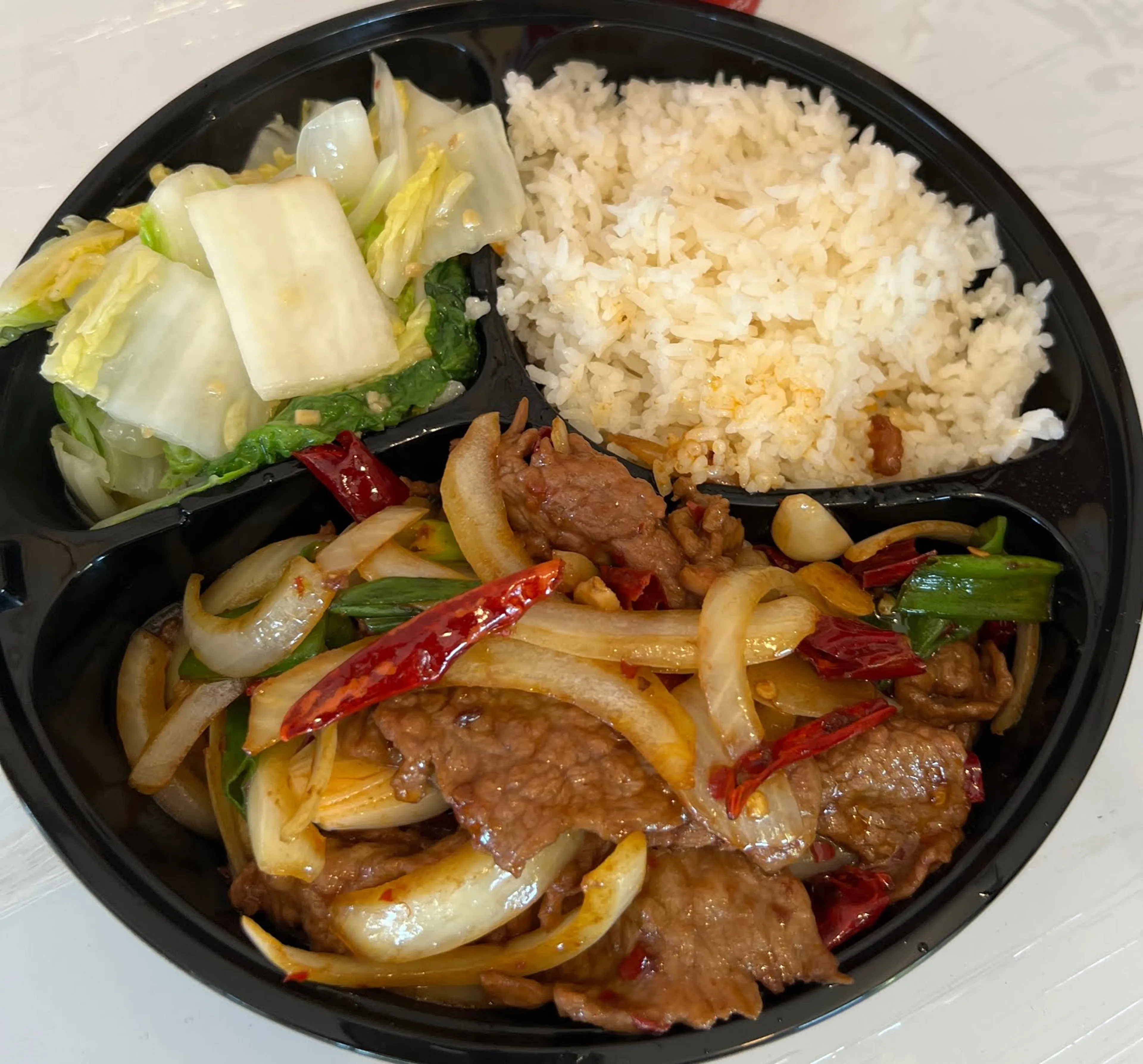 Savor our fiery spicy beef!